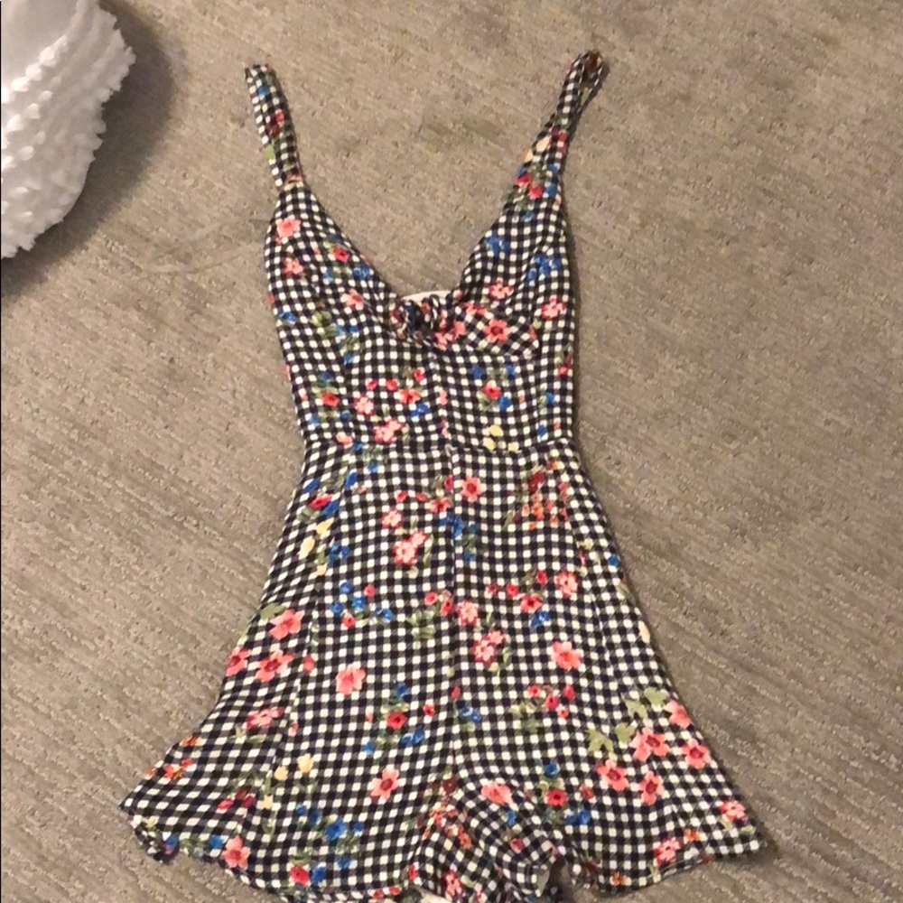 Lush black and white plaid romper with flowers